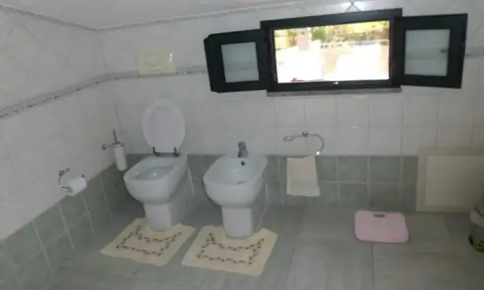Rexer-San-Giovanni-Suergiu-Affitasi-casa-vacanza-BAGNO