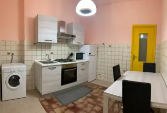 Rexer-Cagliari-Camera-doppia-uso-singola-in-appartamento-CUCINA