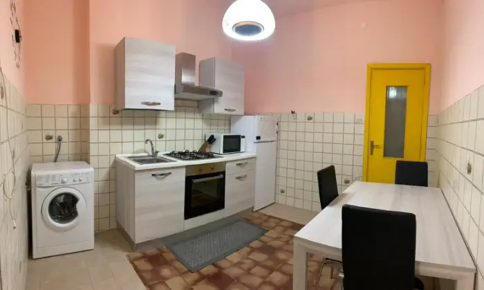 Rexer-Cagliari-Camera-doppia-uso-singola-in-appartamento-CUCINA