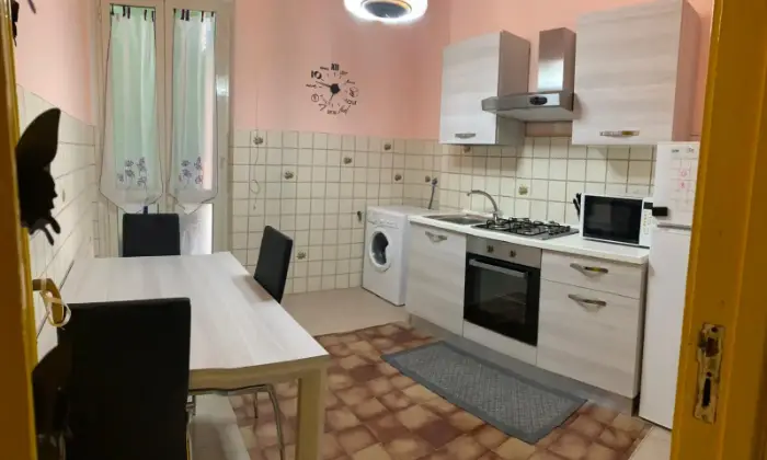 Rexer-Cagliari-Camera-doppia-uso-singola-in-appartamento-CUCINA