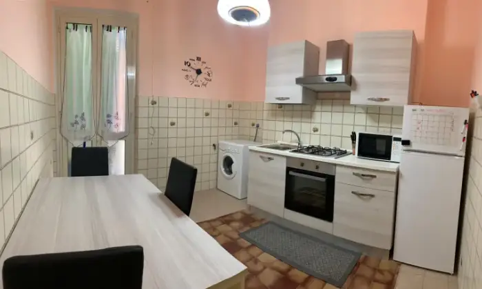 Rexer-Cagliari-Camera-doppia-uso-singola-in-appartamento-CUCINA