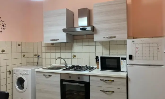Rexer-Cagliari-Camera-doppia-uso-singola-in-appartamento-CUCINA