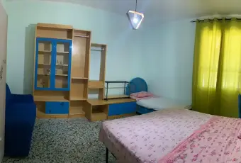 Rexer-Cagliari-Camera-doppia-uso-singola-in-appartamento-CAMERA-DA-LETTO