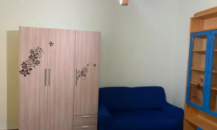 Rexer-Cagliari-Camera-doppia-uso-singola-in-appartamento-CAMERA-DA-LETTO