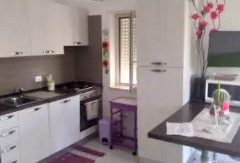 Rexer-Pizzo-Splendido-appartamento-F-con-due-camere-da-letto-PIZZO-BEACH-CLUB-PISCINEparco-giochi-CUCINA