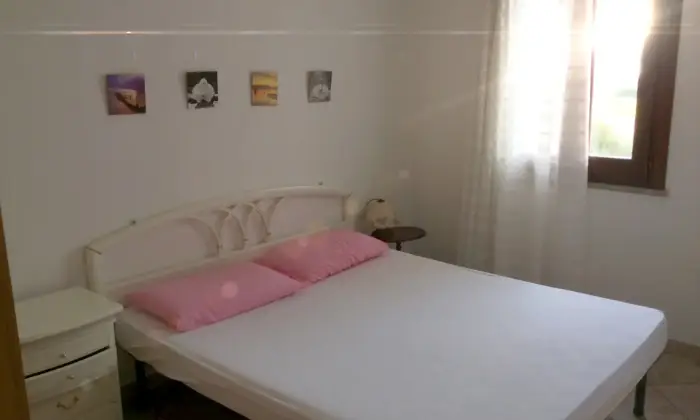 Rexer-San-Teodoro-Appartamento-vacanza-CAMERA-DA-LETTO