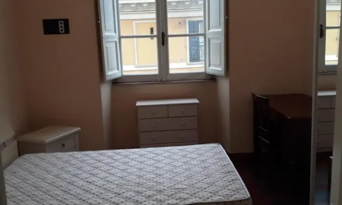 Rexer-Roma-PratiRisorgimento-quadricamere-ristrutturato-ed-arredato-SALONE