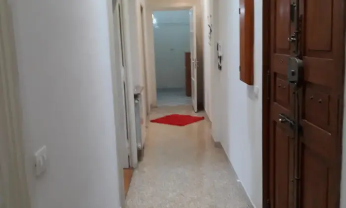 Rexer-Roma-PratiRisorgimento-quadricamere-ristrutturato-ed-arredato-SALONE
