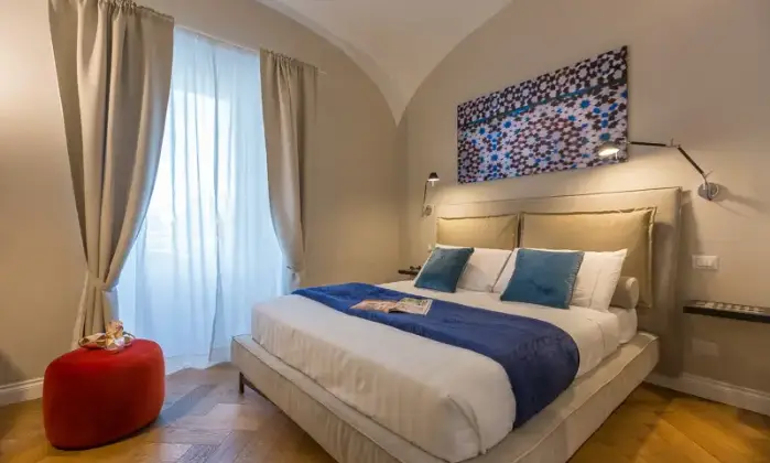 Rexer-Roma-Suite-Trastevere-in-Palazzo-depoca-fronte-fiume-CAMERA-DA-LETTO