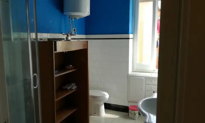 Rexer-Cagliari-Appartamento-per-studentesse-CAMERA-DA-LETTO
