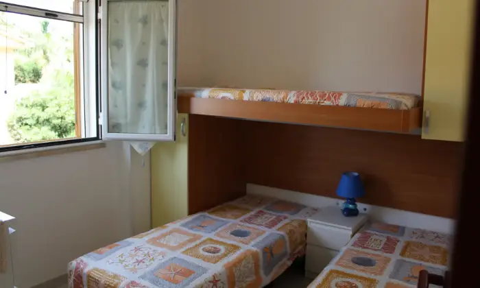 Rexer-Ragusa-Casavacanzekastalia-dentro-Villaggio-Turistico-Athena-Resort-CAMERA-DA-LETTO
