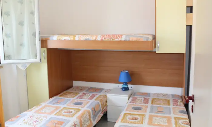 Rexer-Ragusa-Casavacanzekastalia-dentro-Villaggio-Turistico-Athena-Resort-CAMERA-DA-LETTO