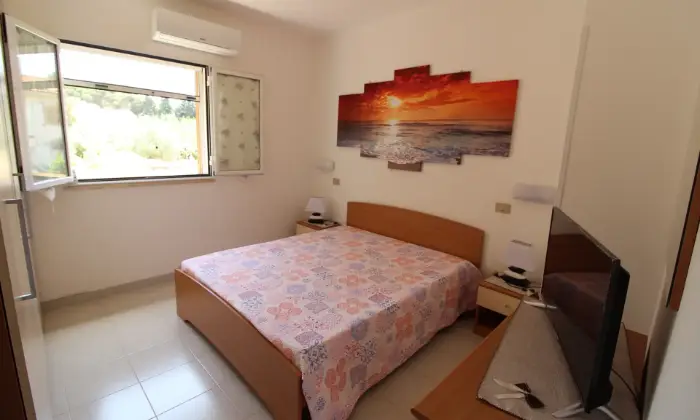 Rexer-Ragusa-Casavacanzekastalia-dentro-Villaggio-Turistico-Athena-Resort-CAMERA-DA-LETTO
