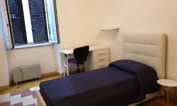 Rexer-Roma-Delizioso-appartamento-a-due-passi-dalla-Sapienza-CAMERA-DA-LETTO