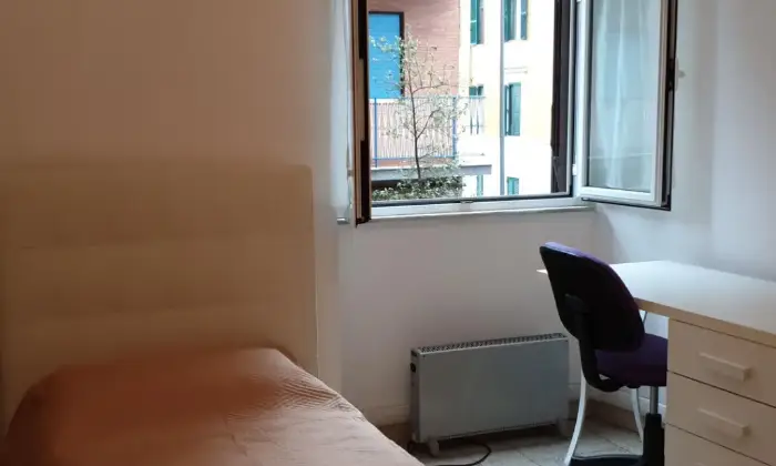 Rexer-Roma-Delizioso-appartamento-a-due-passi-dalla-Sapienza-CAMERA-DA-LETTO
