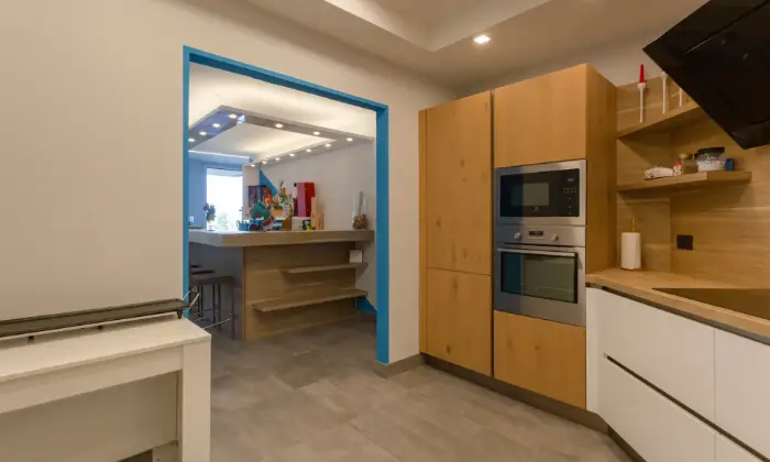 Rexer-Arenzano-Grande-appartamento-sul-mare-CUCINA