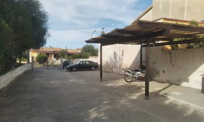 Rexer-Sassari-Casa-del-con-finiture-di-pregio-in-granito-sardo-Giardino