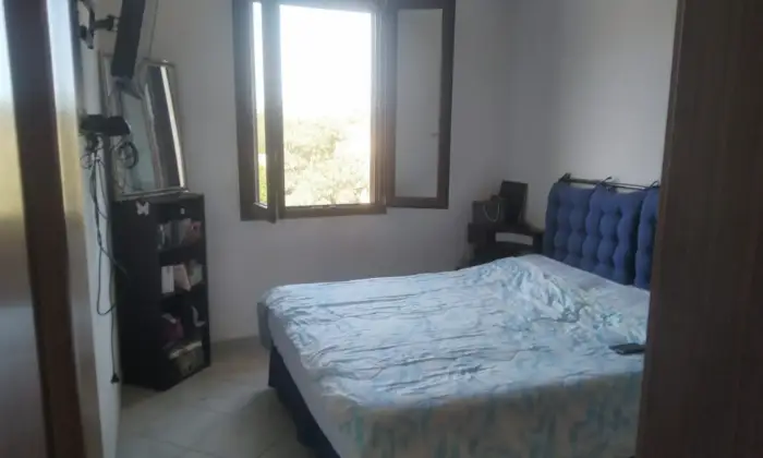 Rexer-Sassari-Casa-del-con-finiture-di-pregio-in-granito-sardo-CameraDaLetto