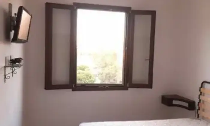 Rexer-Sassari-Casa-del-con-finiture-di-pregio-in-granito-sardo-CAMERA-DA-LETTO