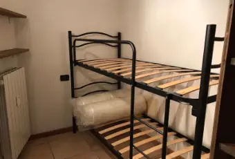 Rexer-Tem-Affittasi-monolocale-a-Villa-Dalegno-CAMERA-DA-LETTO