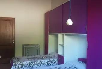 Rexer-San-Teodoro-Casa-vacanza-CAMERA-DA-LETTO