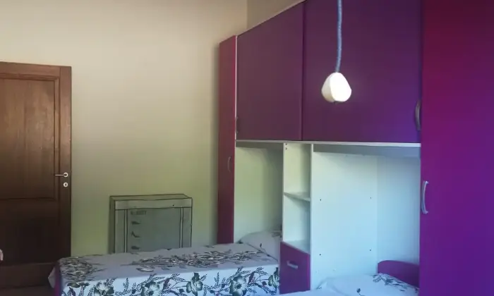 Rexer-San-Teodoro-Casa-vacanza-CAMERA-DA-LETTO
