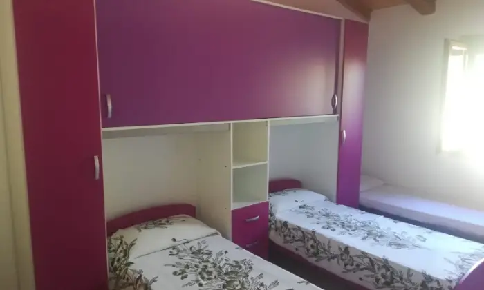 Rexer-San-Teodoro-Casa-vacanza-CAMERA-DA-LETTO