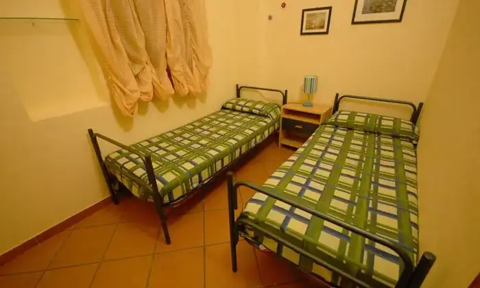 Rexer-Domus-de-Maria-Casa-vacanze-in-affitto-CAMERA-DA-LETTO