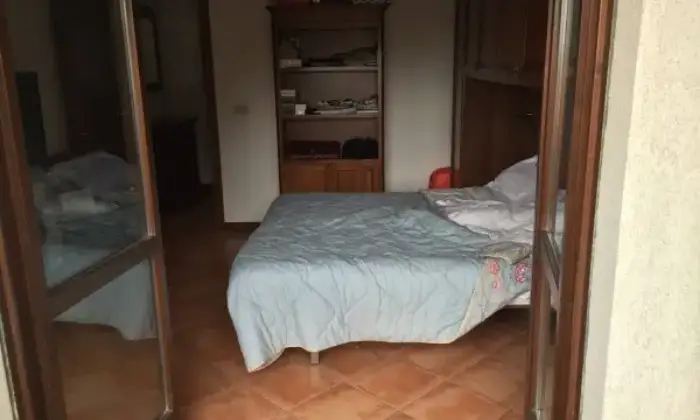 Rexer-Roma-Bilocale-zona-giardino-di-Roma-Camera-da-letto