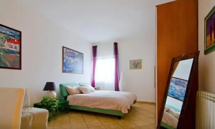 Rexer-Catania-Luminoso-appartamento-al-piano-con-ascensore-e-CON-VISTA-MARE-CAMERA-DA-LETTO