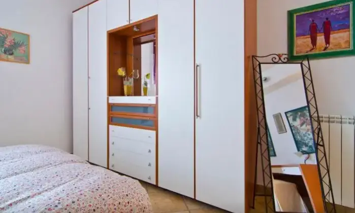 Rexer-Catania-Luminoso-appartamento-al-piano-con-ascensore-e-CON-VISTA-MARE-CAMERA-DA-LETTO