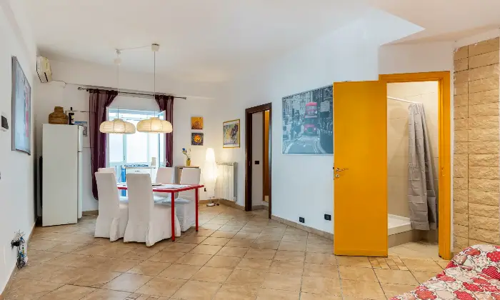 Rexer-Catania-Luminoso-appartamento-al-piano-con-ascensore-e-CON-VISTA-MARE-SALONE