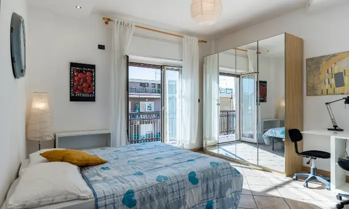 Rexer-Catania-Luminoso-appartamento-al-piano-con-ascensore-e-CON-VISTA-MARE-CAMERA-DA-LETTO