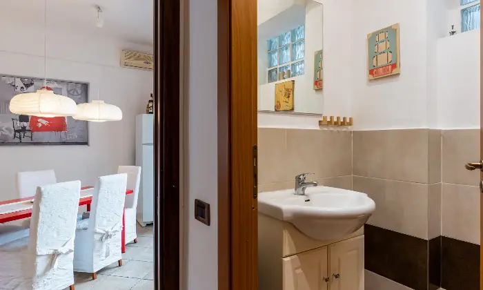 Rexer-Catania-Luminoso-appartamento-al-piano-con-ascensore-e-CON-VISTA-MARE-BAGNO