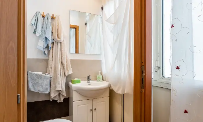 Rexer-Catania-Luminoso-appartamento-al-piano-con-ascensore-e-CON-VISTA-MARE-BAGNO