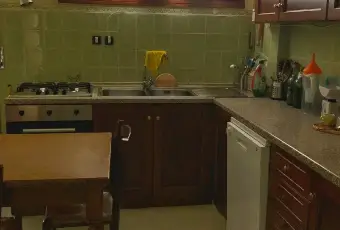 Rexer-Pisa-Stanza-doppia-arredata-CUCINA