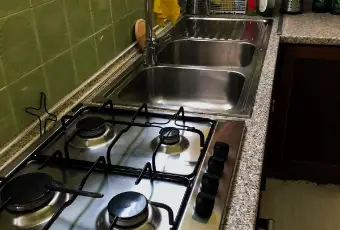 Rexer-Pisa-Stanza-doppia-arredata-CUCINA