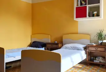 Rexer-Pisa-Stanza-doppia-arredata-CAMERA-DA-LETTO