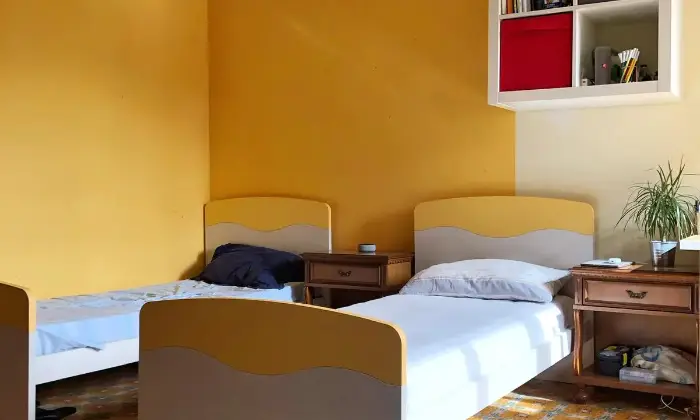 Rexer-Pisa-Stanza-doppia-arredata-CAMERA-DA-LETTO