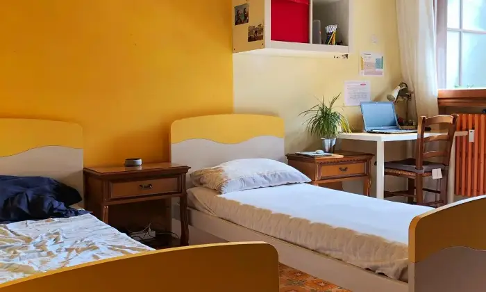 Rexer-Pisa-Stanza-doppia-arredata-CAMERA-DA-LETTO