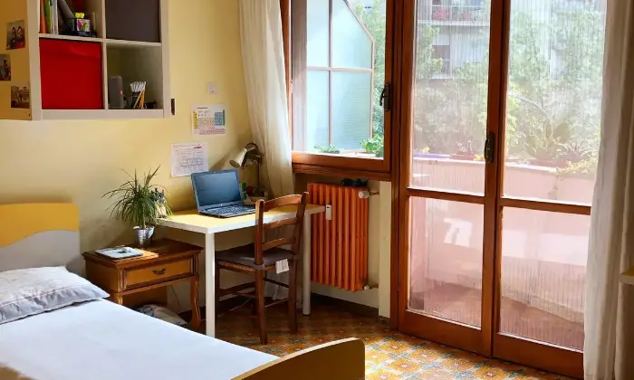 Rexer-Pisa-Stanza-doppia-arredata-CAMERA-DA-LETTO