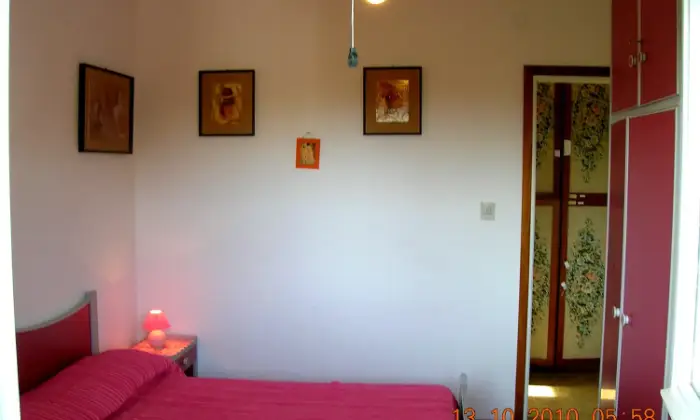 Rexer-Grado-Splendido-attico-vista-pineta-e-mare-a-Grado-CAMERA-DA-LETTO