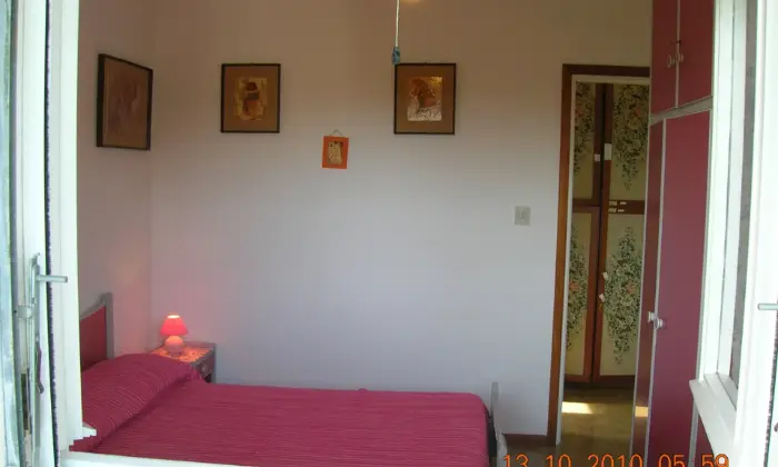 Rexer-Grado-Splendido-attico-vista-pineta-e-mare-a-Grado-CAMERA-DA-LETTO