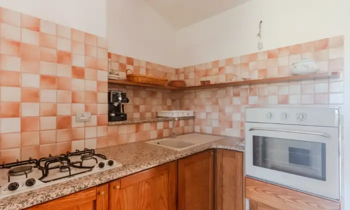Rexer-Aglientu-Deliziosa-villetta-con-ampio-spazio-esterno-vista-mare-CUCINA