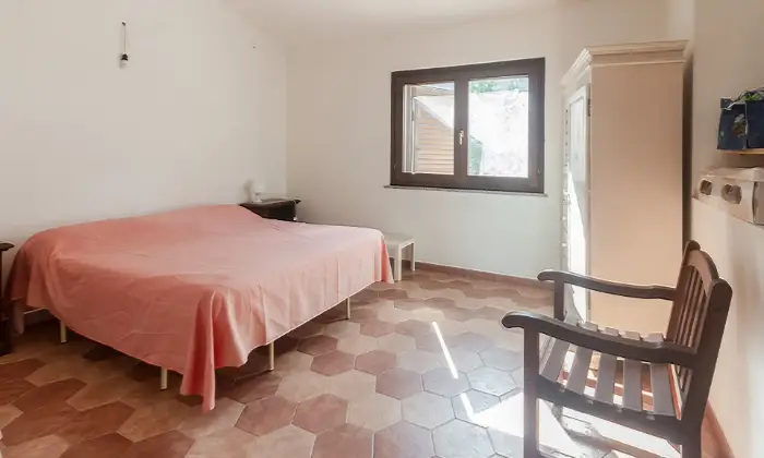 Rexer-Aglientu-Deliziosa-villetta-con-ampio-spazio-esterno-vista-mare-CAMERA-DA-LETTO