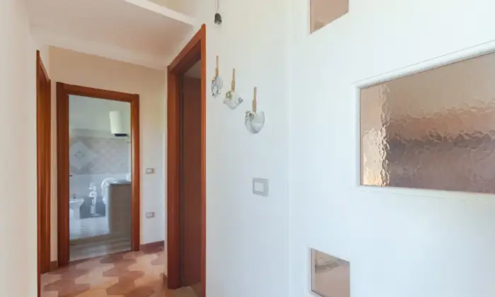 Rexer-Aglientu-Deliziosa-villetta-con-ampio-spazio-esterno-vista-mare-DISIMPEGNO