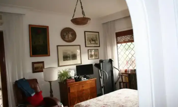 Rexer-Roma-Attico-Mansarda-a-Roma-CAMERA-DA-LETTO
