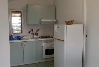 Rexer-Vittoria-In-vacanza-in-villaggio-turistico-CasaVacanze-Le-Mansarde-in-Athena-Resort-Scoglitti-RG-CUCINA
