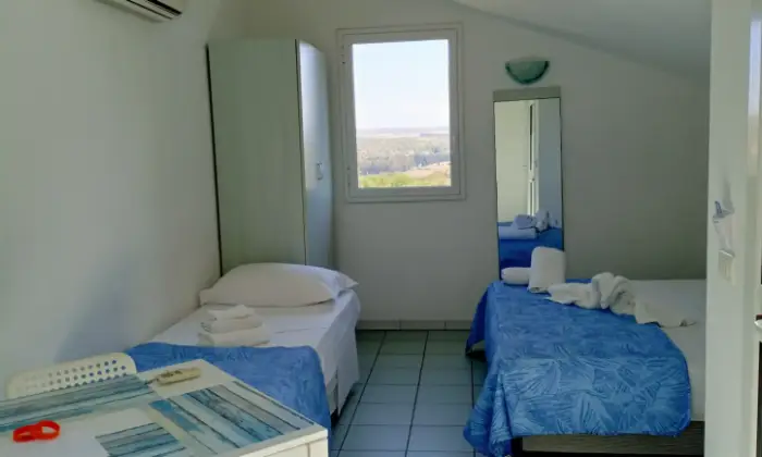 Rexer-Vittoria-In-vacanza-in-villaggio-turistico-CasaVacanze-Le-Mansarde-in-Athena-Resort-Scoglitti-RG-CAMERA-DA-LETTO