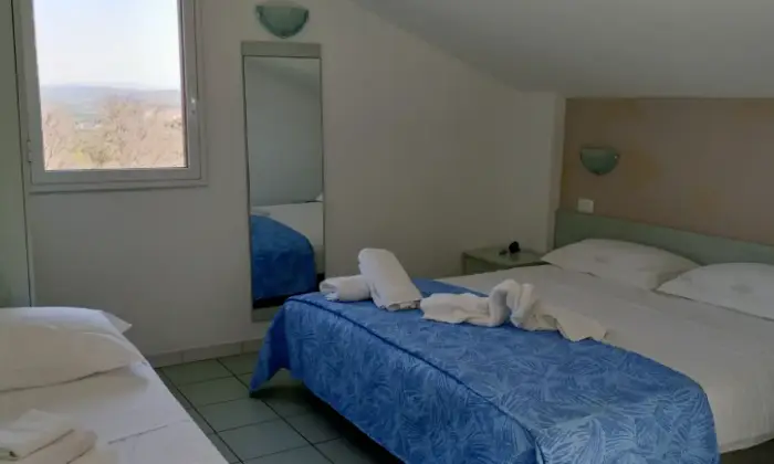 Rexer-Vittoria-In-vacanza-in-villaggio-turistico-CasaVacanze-Le-Mansarde-in-Athena-Resort-Scoglitti-RG-CAMERA-DA-LETTO